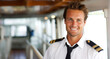 Portrait of a handsome pilot on a cruise ship, smiling.