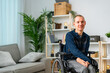 © unai - Portrait of a cheerful disabled man chilling at home