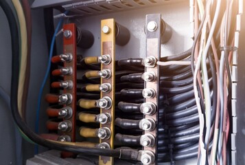 Three phase cable point with copper busbar and  connection bolt tightening.