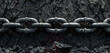 Sturdy metal chains on a dark grungy textured backdrop.
