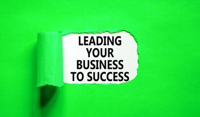 Wall Mural - Leading your business to success symbol. Concept words Leading your business to success on beautiful white paper. Beautiful green paper background. Leading your business to success concept. Copy space