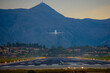 © ernestos - View of the airport and a plane taking off in corfu,Greece