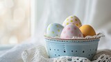 Fototapeta  - Easter postcard with polka-dot eggs in a vintage container on a lace doily