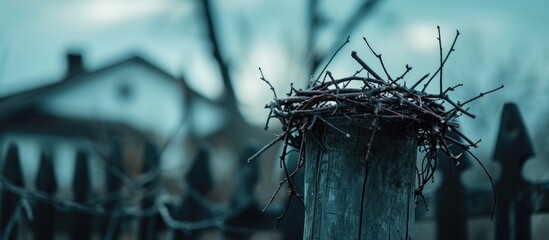 Wall Mural - Thorny crown on post near Christian church during Lent