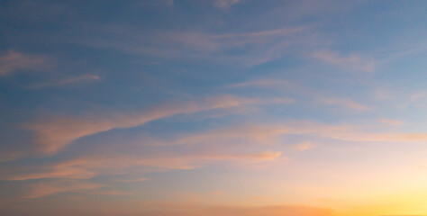 Wall Mural - Sunset sky. Abstract nature background. Dramatic blue with orange colorful clouds in twilight time.