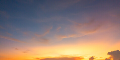 Wall Mural - Sunset sky. Abstract nature background. Dramatic blue with orange colorful clouds in twilight time.