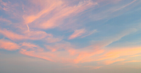 Wall Mural - Sunset sky. Abstract nature background. Dramatic blue with orange colorful clouds in twilight time.