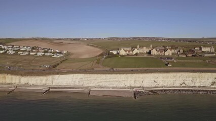 Wall Mural - Aerial video along the chalk cliffs near Brighton Marina with Roedean School for girls in view.