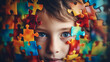 portrait of a child  face and color puzzle. world autism awareness day or month concept.