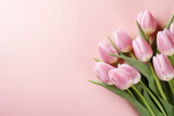 Fototapeta Tulipany - tulips bouquet on pink background with copyspace