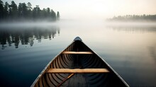 Bow Of A Canoe In The Morning On A Misty Lake In Ontario Canada