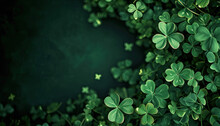 Solid Dark Green Background With Lots Of Free Space With A Bit Of A Realistic Small Photo Of Shamrock Clover Leaves At The Edges