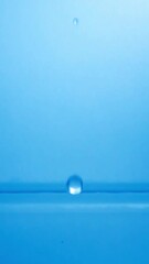 Wall Mural - slow motion falling drops of water