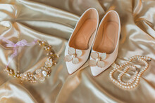 Weddings Women White Shoes With No Heels With A Flowers And Pearls. Concept Of Wedding, Accessorize