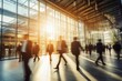 © Visual Craft - motion blur of busy lobby of modern office building with people walking by
