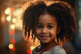 Fototapeta  - Happy African American girl with pony tails and afro puff hair.