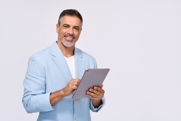 Wall Mural - Happy middle aged business man ceo wearing suit standing isolated on white using digital tablet. Smiling mature businessman professional executive manager looking at camera holding device. Portrait