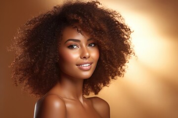 Wall Mural - Beautiful  smiling African American woman with healthy skin and curly hair.