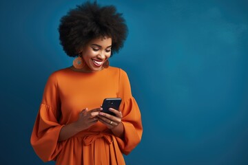 Stylish Afro American woman using cell phone  pointing.