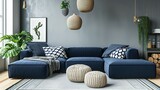 Fototapeta  - Modern living room. Two knitted pouffes near a dark blue corner sofa. Scandinavian home interior design modern living room.