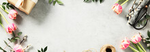 Banner. Easter Background With Spring Flowers, Eggs, Feathers, Gift Boxes On Light Grey Background