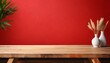 © Marcelo - empty wooden table on red wall background