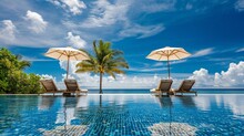 Stunning Landscape, Swimming Pool Blue Sky With Clouds. Tropical Resort Hotel In Maldives. Fantastic Relax And Peaceful Vibes, Chairs, Loungers Under Umbrella And Palm Leaves. Luxury Travel Vacation