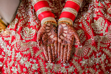 Indian bride's henna mehendi mehndi hands close up