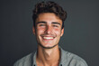 © MagnusCort - A young man with a beard is smiling for the camera