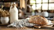  a loaf of bread sitting on top of a wooden table next to a bottle of milk and a basket of wheat on top of a wooden table next to a bottle.
