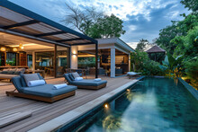 A Lavish Side Outside Garden At Morning, With A Teak Hardwood Deck And A Black Pergola. Scene In The Evening With Couches And Lounge Chairs By The Pool