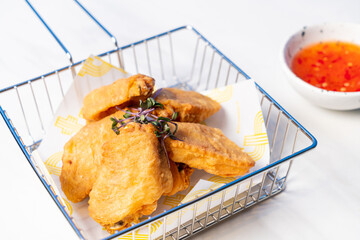 Sticker - fried chicken wings with sauce