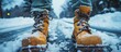 Winter boots and road coated with anti-icing chemicals help prevent ice on surfaces effectively.