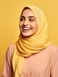 © talkative.studio - Photo of a beautiful young muslim woman smiling