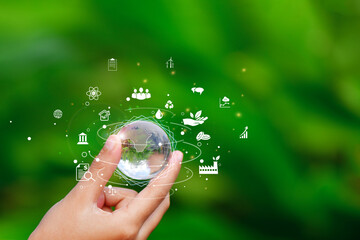 Wall Mural - hand holding globe with environment icon to technology organization sustainable development environm
