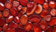 Variety of red agate stones background 
