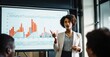 © Stock Pix - A powerful depiction of a Black female executive leading a fintech meeting in a modern, diverse office.