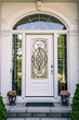 © Pillow Productions - White front door with glass insert, sidelights and semicircular transom