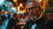 Happy Mature Businessman Wearing Suit And Glasses