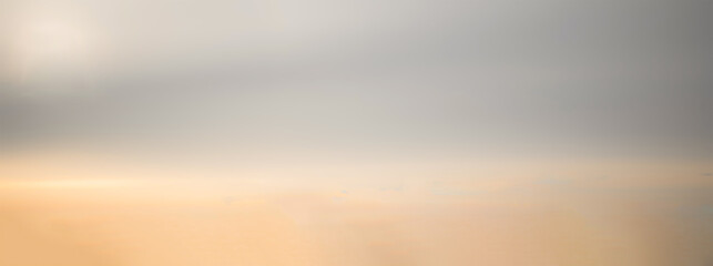 Wall Mural - gray blurry sky background with light pink clouds