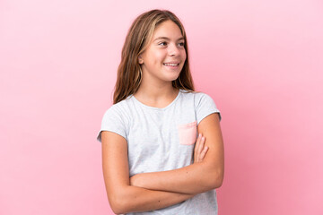 Wall Mural - Little caucasian girl isolated on pink background happy and smiling