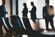 © PixelFoundry - Silhouettes of business professionals in a modern office meeting