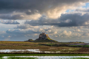 Canvas Print - Stunning dramatic landscape image of Lindisfarne, Holy Island in Northumberland England during Winter