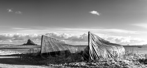 Canvas Print - Stunning  black and white dramatic landscape image of Lindisfarne, Holy Island in Northumberland England during Winter