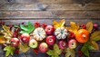 thanksgiving background apples pumpkins and fallen leaves on wooden background copy space for text halloween thanksgiving day or seasonal background design mock up