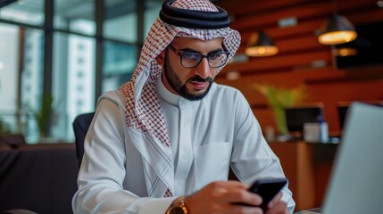 arab man working with smartphone in the office. business and finance concept.