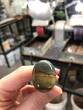 hand holding a cabochon 