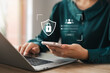 © Prae_Studio - Cybersecurity and privacy concepts to protect data. Lock icon and internet network security technology. Businesswomen protecting personal data on smartphone virtual interfaces.