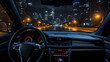 Driving the car at night. Point of view of driver from inside car. Night city.