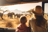 Fototapeta  - Family safari experience observing African elephants